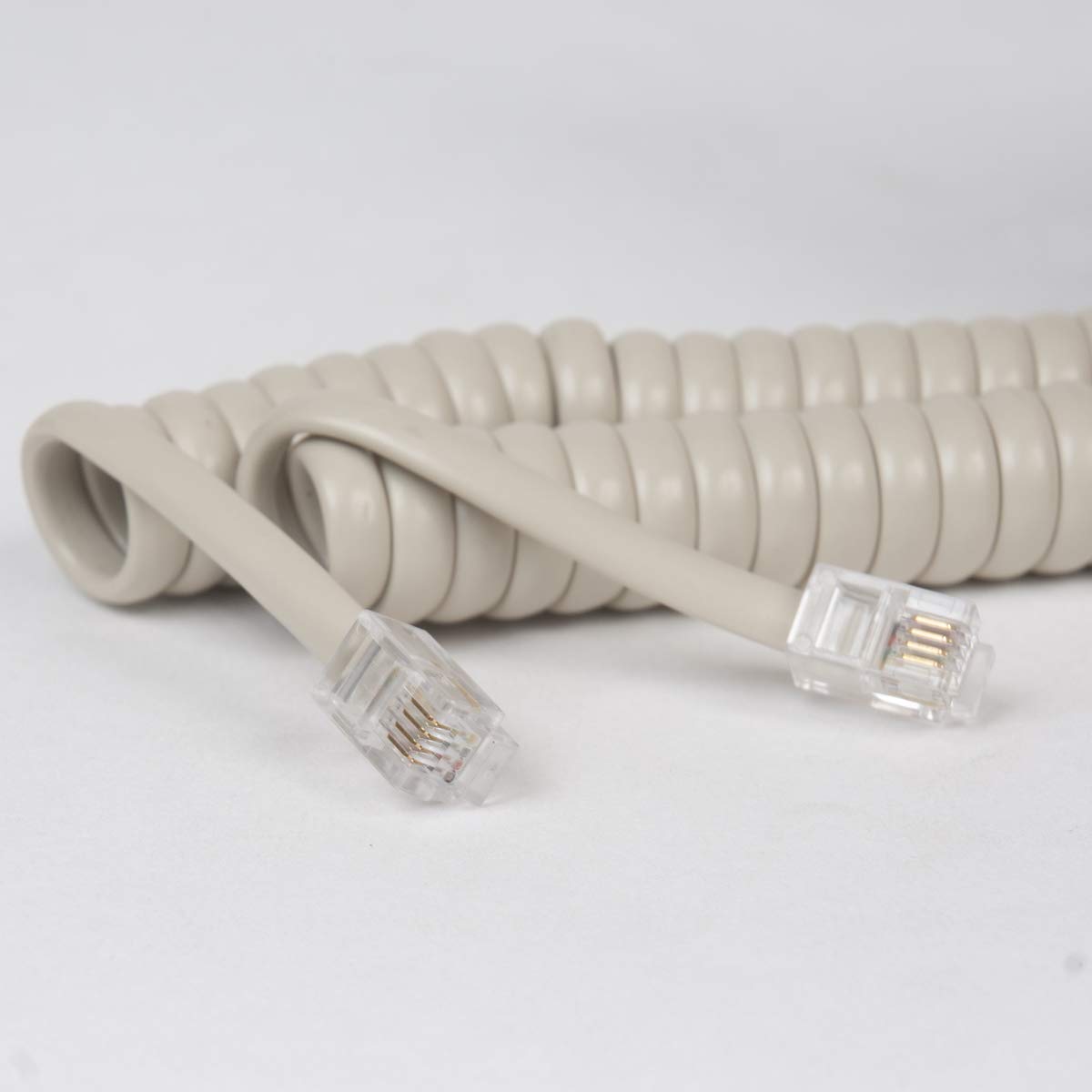 Cablesys ICC Coiled Telephone Handset Cord for Use with PBX Phone Systems, VoIP Telephones - 12 Ft Uncoiled, Rj22, 1.5 Inch Lead on Both Ends, Dark