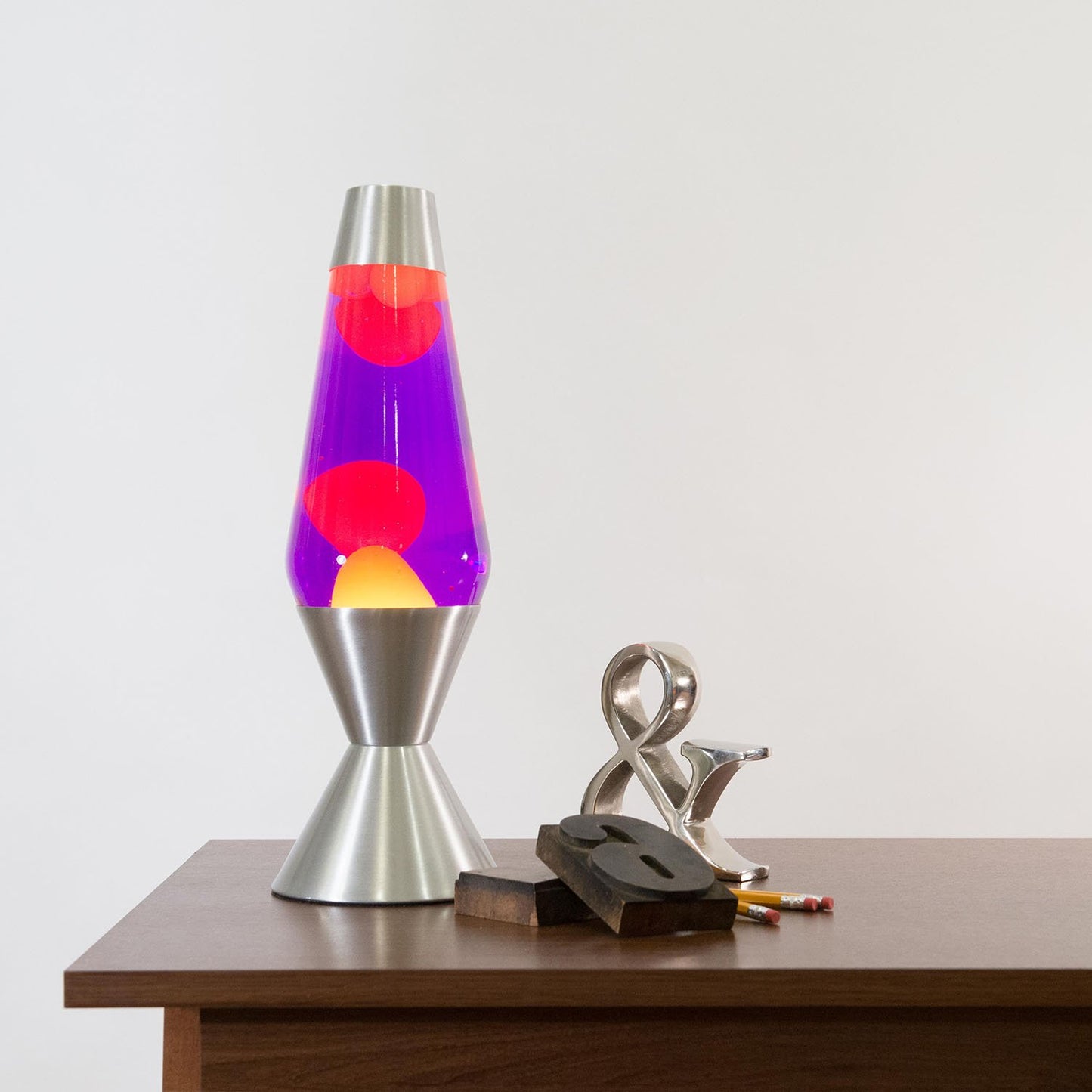 Lava the Original 16.3-Inch Silver Base Lamp with Yellow Wax in Purple Liquid, Yellow / Purple / Silver