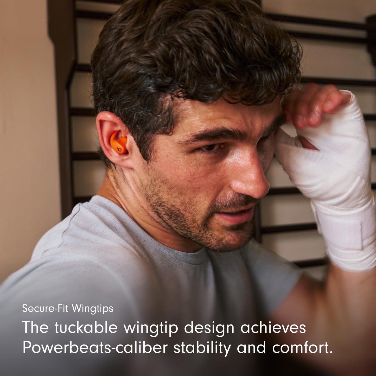 Beats Powerbeats Fit - Wireless Noise Cancelling, with Secure-Fit Wingtips, Up to 30-Hour Battery Life, Apple & Android Compatible - Spark Orange