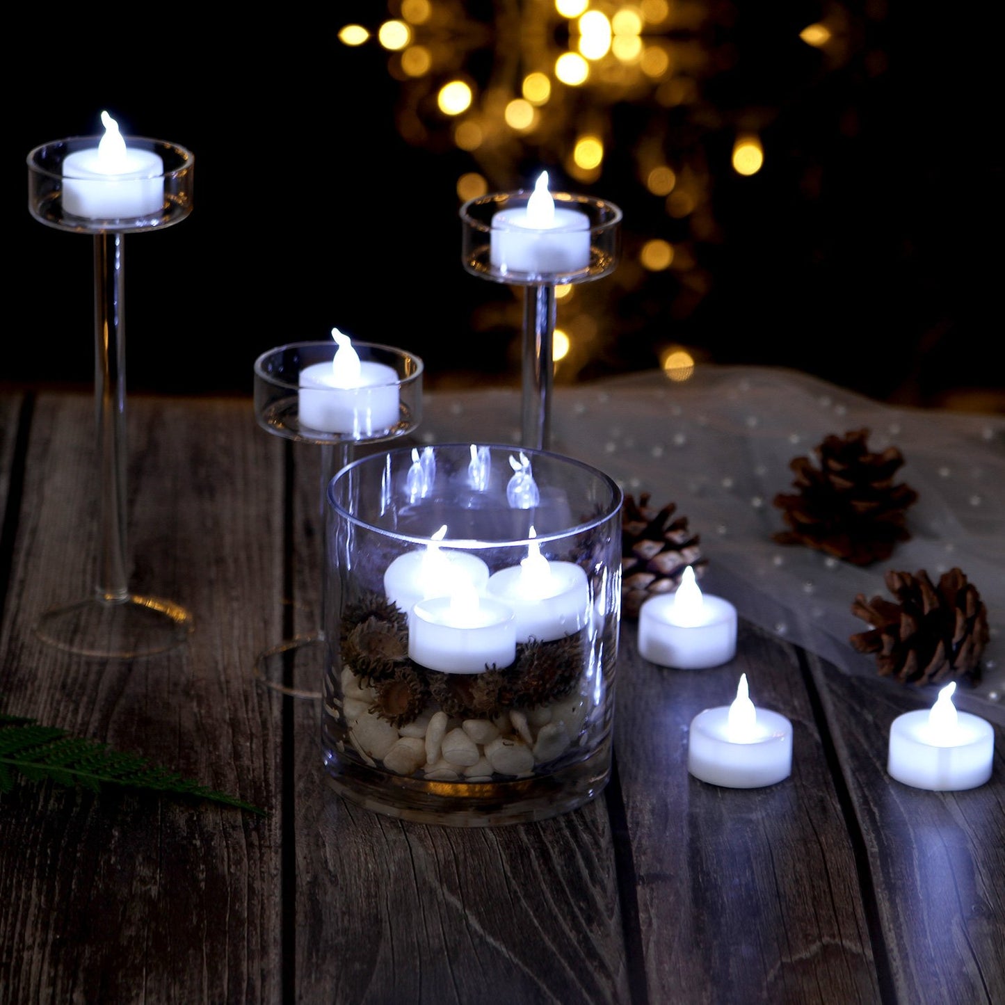 AGPTEK Tea Lights with Flicker,100 Pack Flickering Flameless LED Candles Battery Operated Tealight Candles Long Lasting Tealight for Wedding Holiday