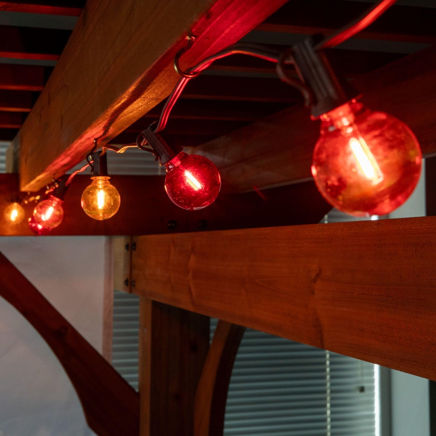 Novelty Lights G40 Filament LED String Light, Translucent Red/Orange/Yellow Bulbs, 25 Globe Lights with 12" Spacing on Green Wire, Indoor/Outdoor