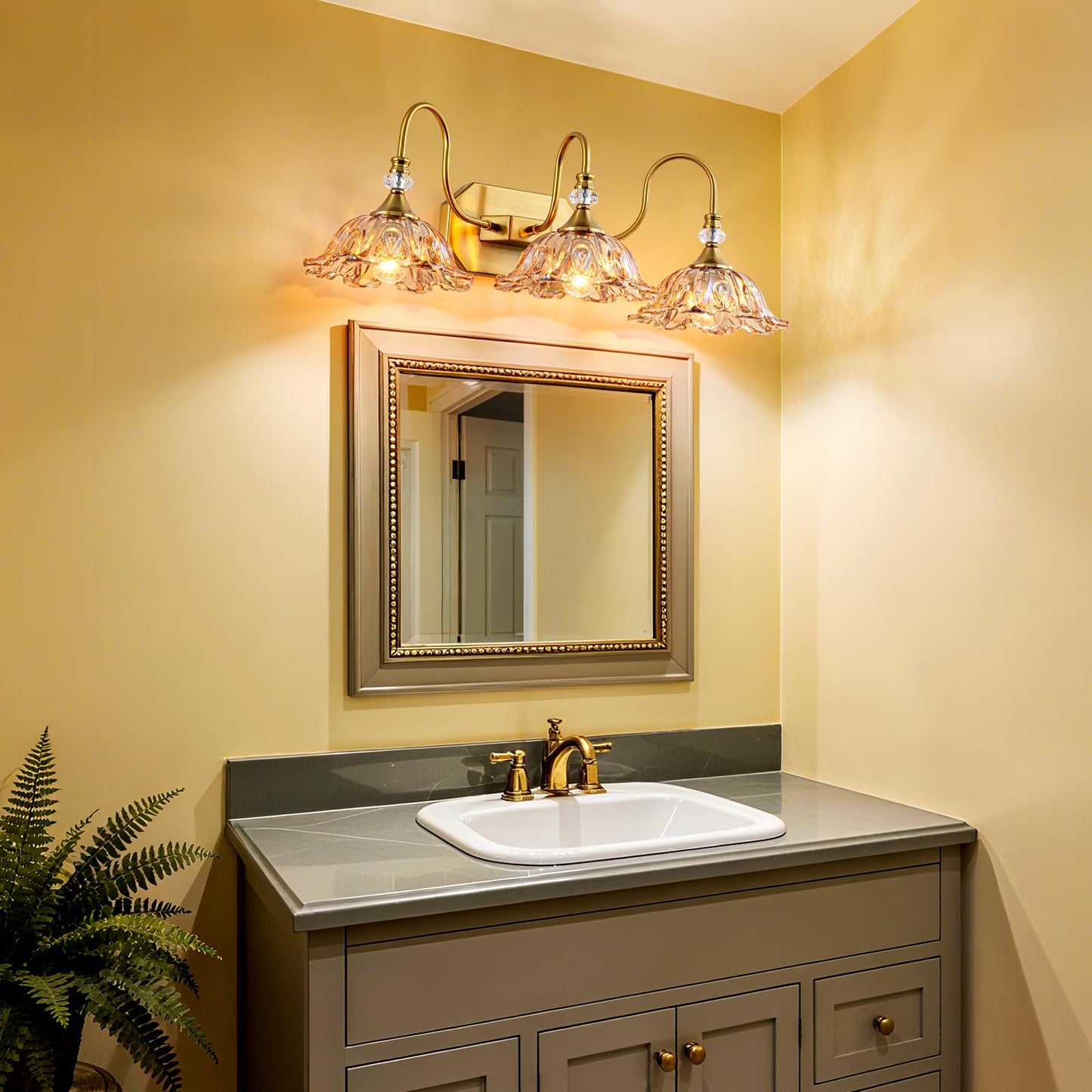 YOGIRL Vintage Gold Bathroom Vanity Light, 3-Lights Matte Antique Brass Finish with Flower Shaped Amber Glass Shades Light Fixture for Bathroom