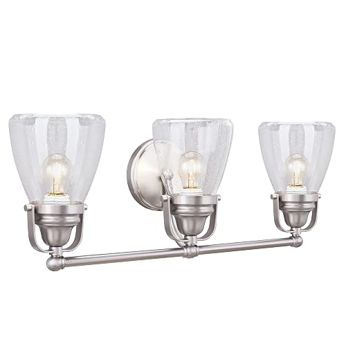 Aspen Creative 62099, Three-Light Metal Bathroom Vanity Wall Light Fixture, 24 1/2" Wide, Transitional Design in Brushed Nickel with Clear Seedy Glass