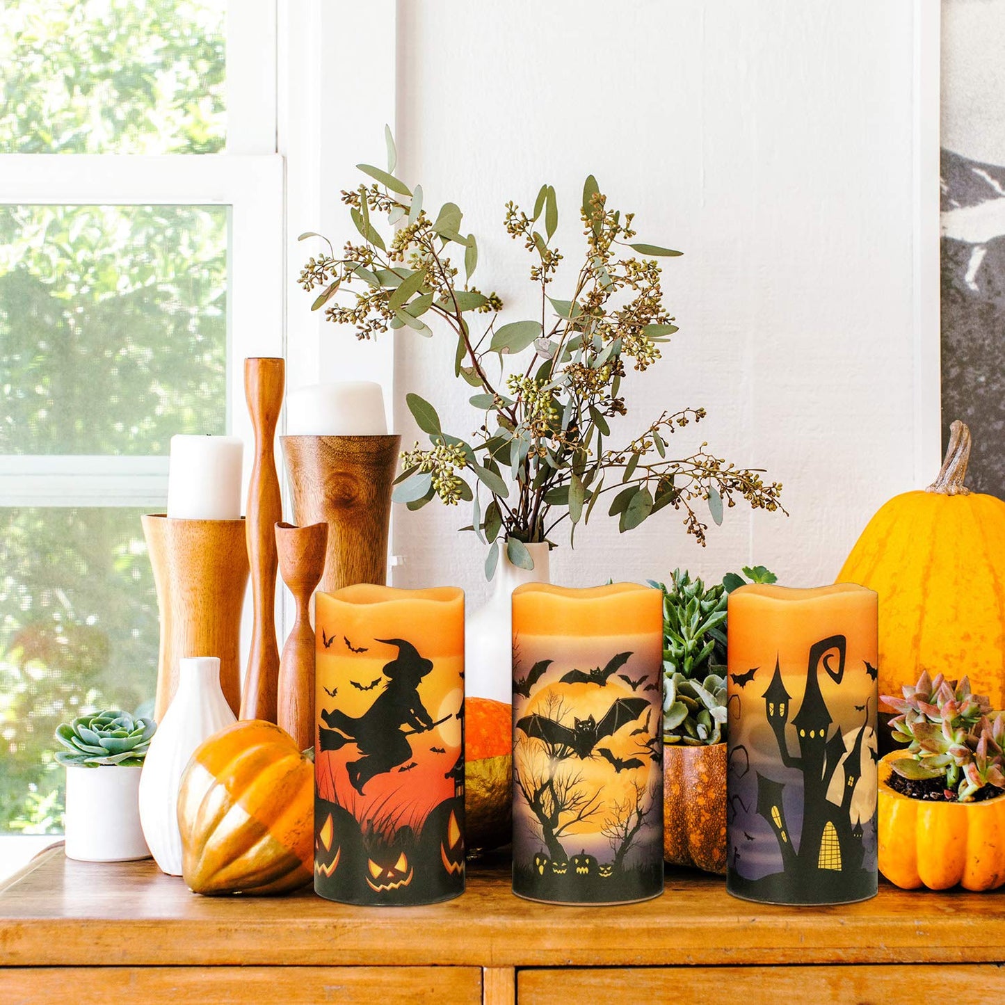 Eldnacele Halloween Flameless Flickering LED Candles with 6-Hour Timer, Battery Operated Wax Candles Assorted Decals Witch, Bats, Castle Set of 3