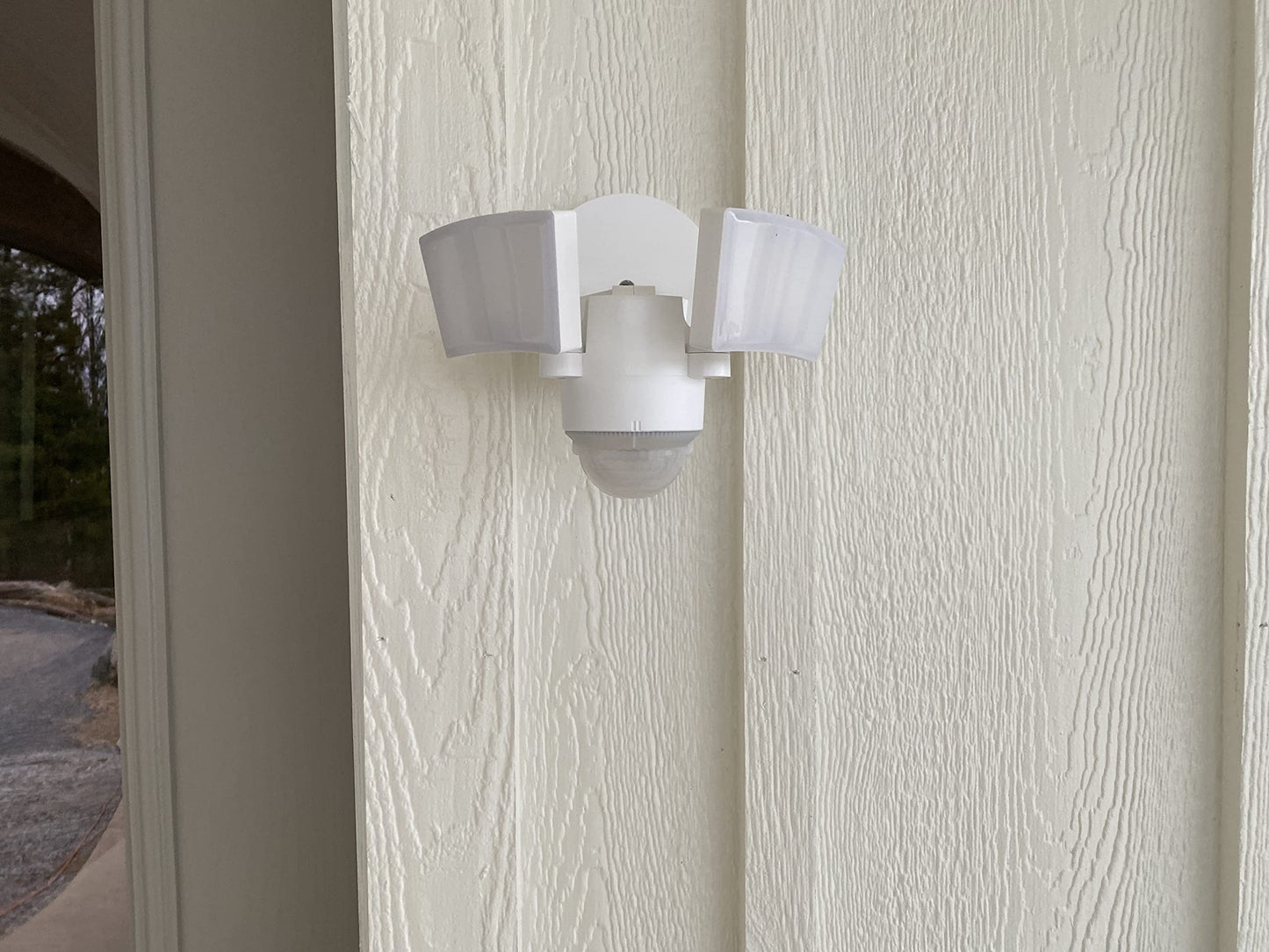 IQ AMERICA LED Outdoor Motion Sensor Security Floodlight - 1100 Lumens, 180° Detection, Weatherproof Design, Versatile Eave or Wall Mounting, Exit