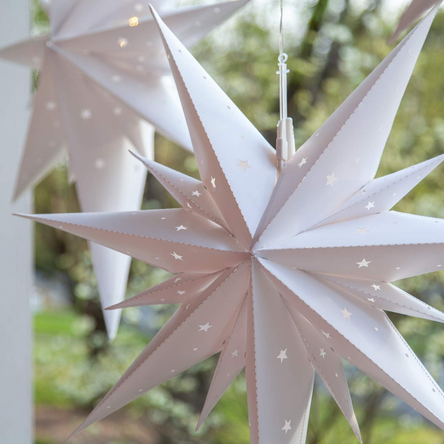 Wintergreen Lighting 26" White Bethlehem Star Fold-Flat Christmas Star Lights Reusable LED Plug-in or Battery Indoor-Outdoor 3D Hanging Decoration