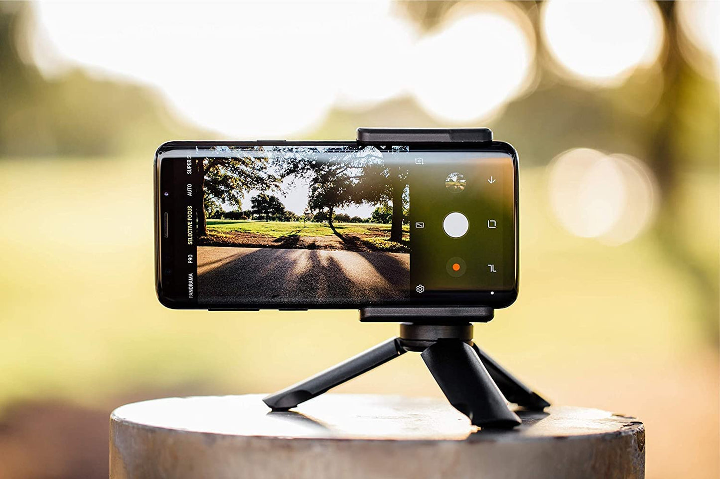 Adonit Photogrip (Black) Shutter Remote Bluetooth Selfies Included Tripod, Travel Case, Mini Stylus. Smartphone HandGrip Camera Stable Shots