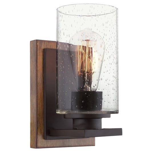 Kira Home Sedona 9" Rustic Farmhouse Wall Sconce with Clear Seeded Glass Shade, Hand-Painted Wood Grain Metal, Walnut Wood and Oil Rubbed Bronze