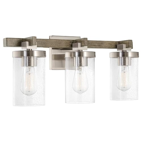 Kira Home Concord 22" 3-Light Farmhouse Vanity Light with Seeded Glass Cylinder Shades, Hand-Painted Wood Grain Metal Bathroom Light, Reclaimed Oak