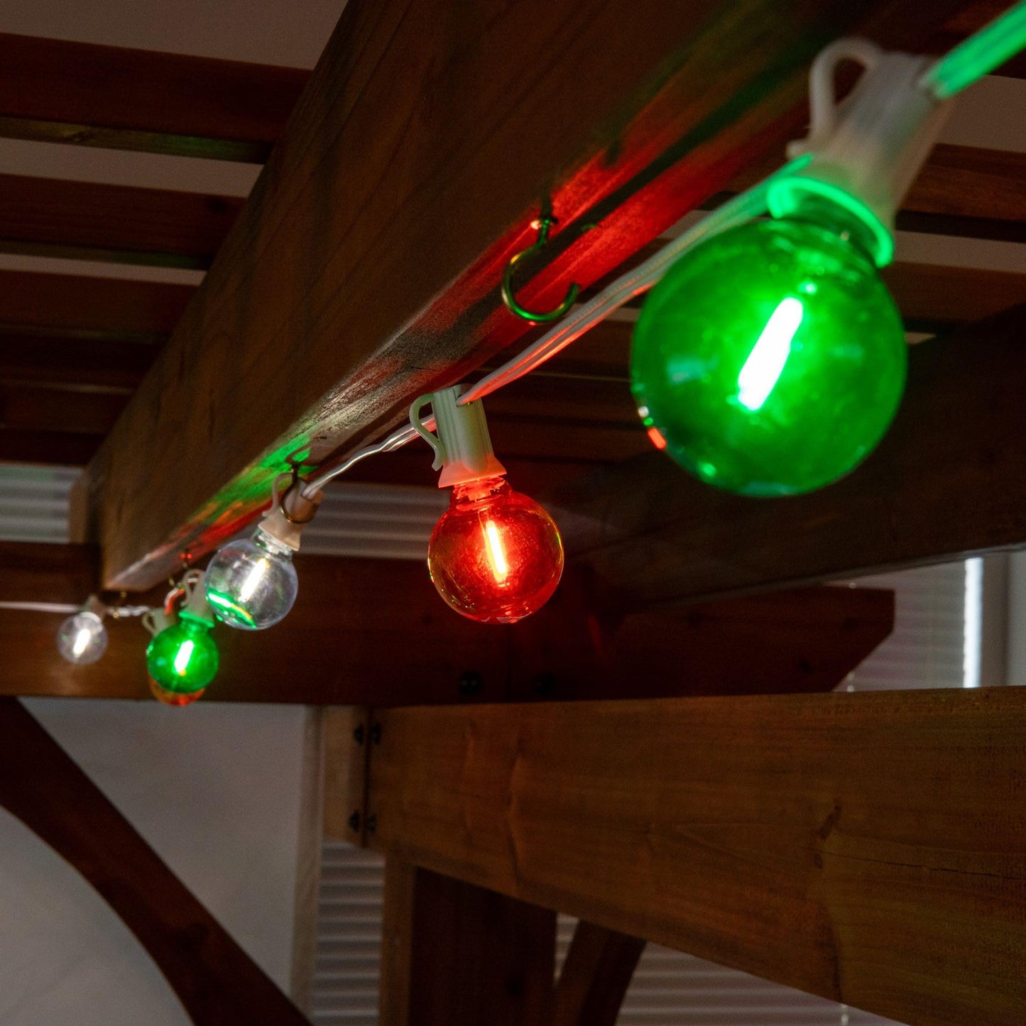 Novelty Lights G40 Filament LED String Light, Translucent Orange/Green/White Bulbs, 25 Globe Lights with 12" Spacing on White Wire, Indoor/Outdoor