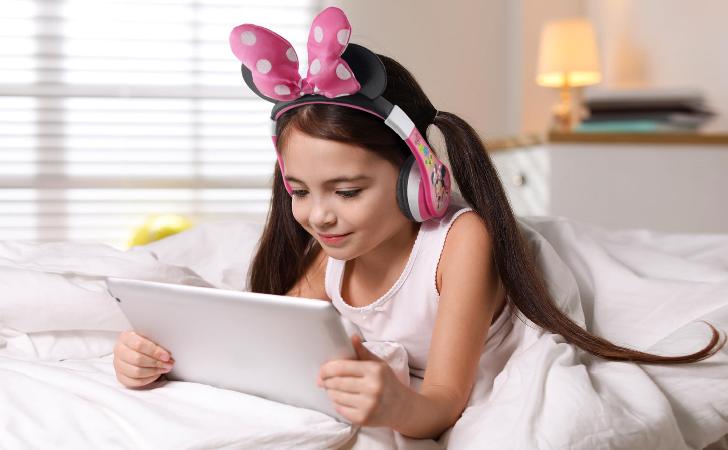 eKids Minnie Mouse Kids Bluetooth Headphones, Wireless with Microphone Includes Aux Cord, Volume Reduced Foldable Headphones for School, Home, or