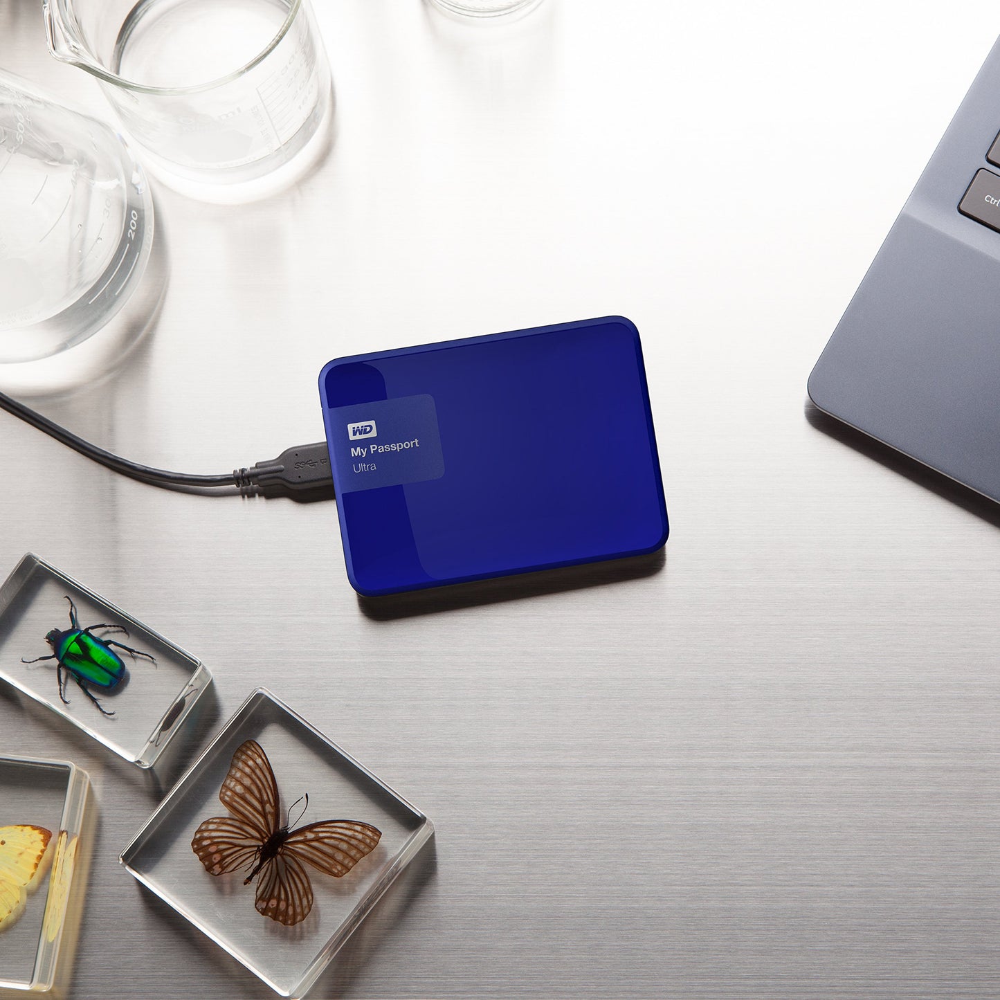WD 1TB My Passport Ultra USB 3.0 Secure Portable External Hard Drive, Blue (WDBGPU0010BBL-NESN) [Old Model]