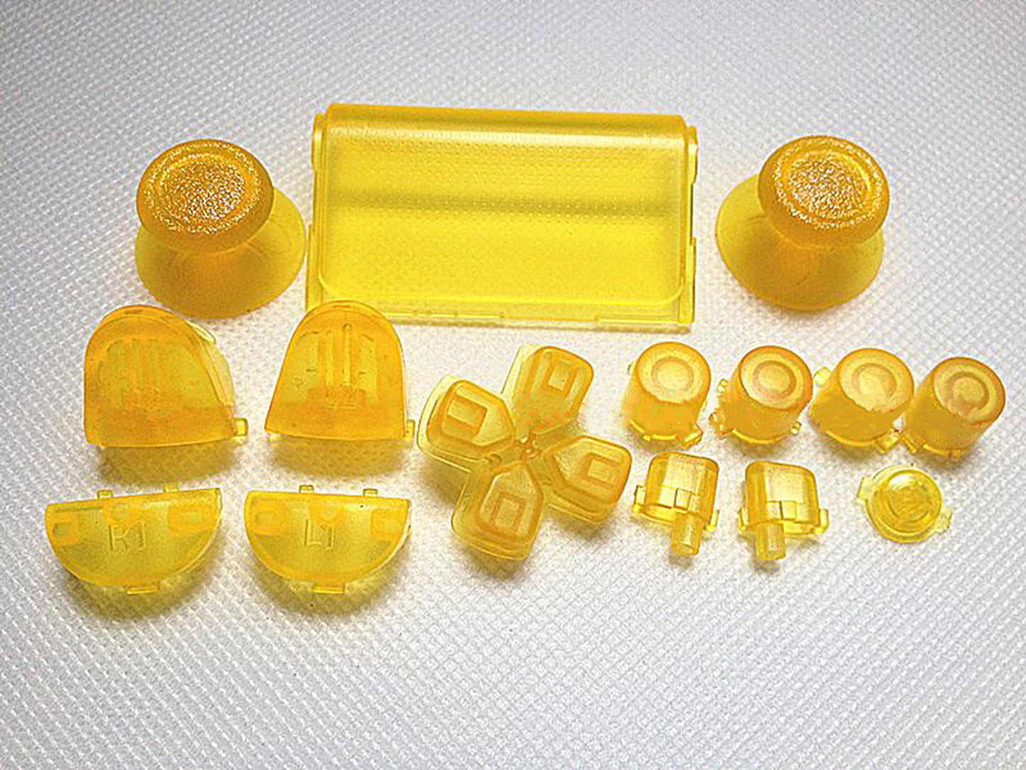 Gametown Joysticks Thumbsticks Dpad R1 L1 R2 L2 Trigger Buttons Set + 2X Springs for PS4 Controller Color Transparent Clear Yellow